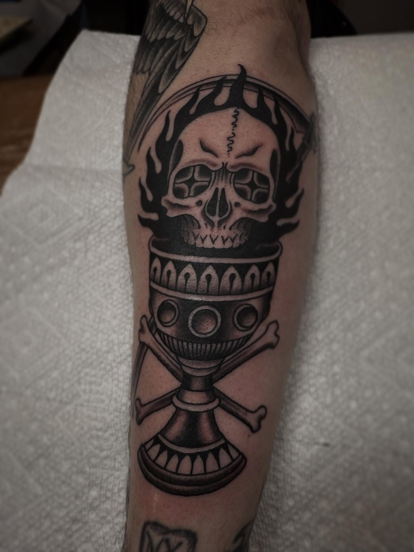 Skull chalice realism tattoo on the forearm by Cole Pittman Memphis Tattoo artist, Memphis, Tennessee