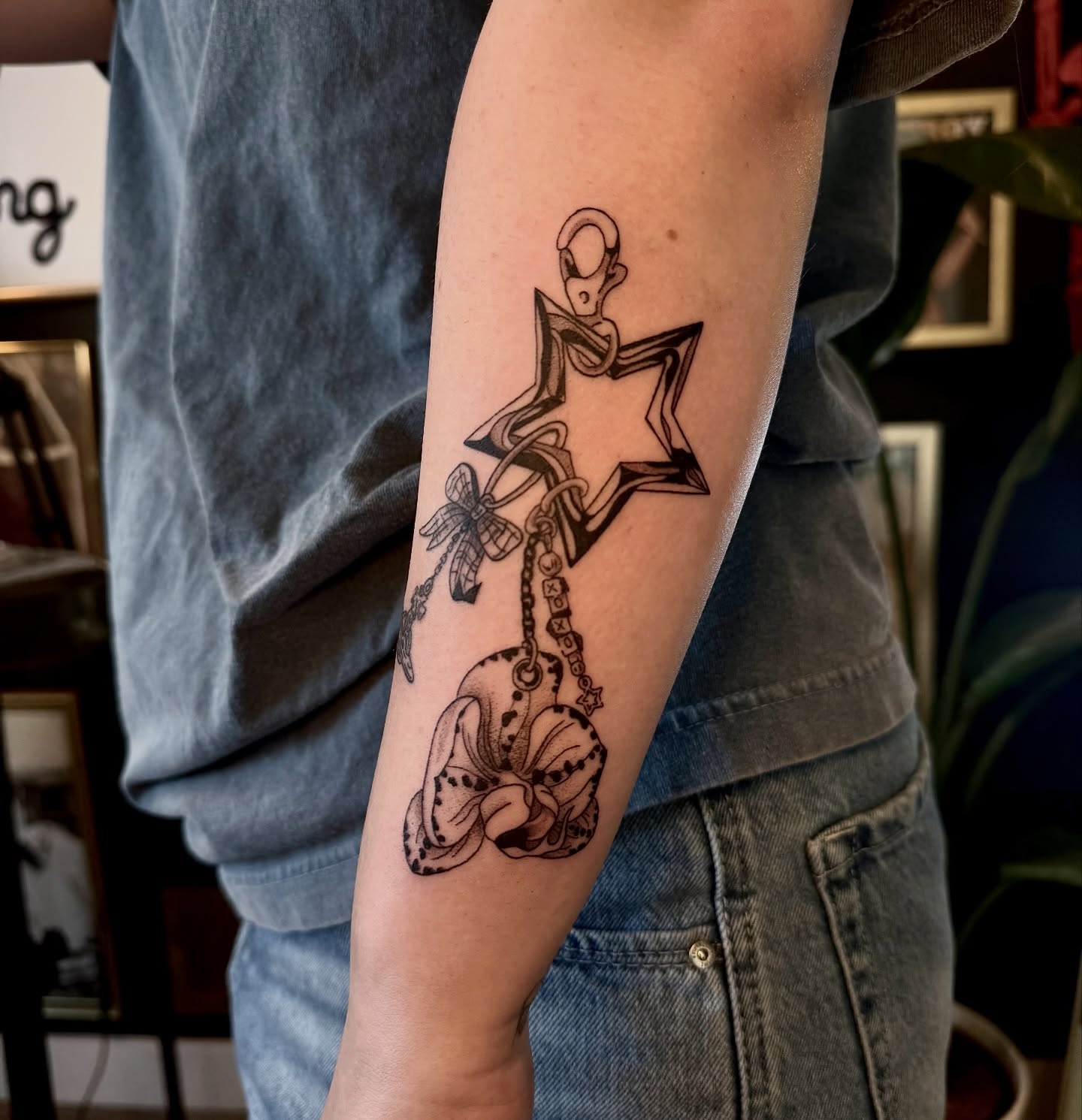 Star and flower black and grey tattoo on the forearm by Ki ☆ SLC TATTOO ARTIST