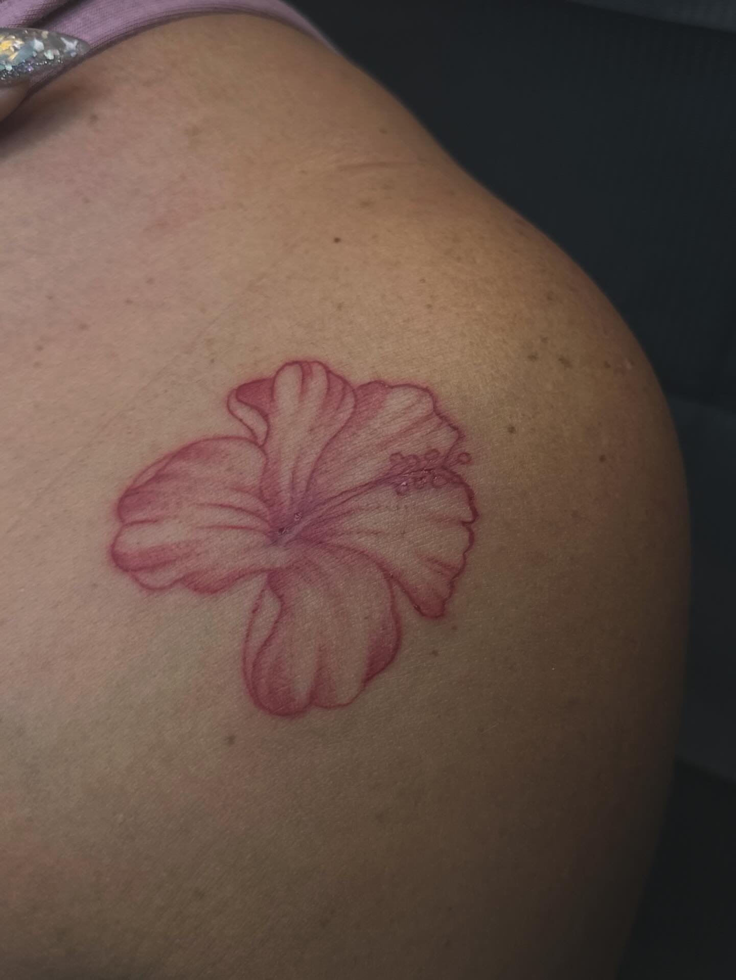 Hawaiian flower realism tattoo on the shoulder by Inked By E, Philadelphia, Pennsylvania