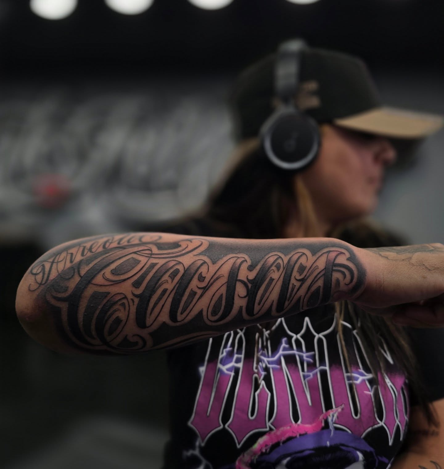 Script lettering lettering script tattoo on the forearm by Richie Garcia, Hesperia, California