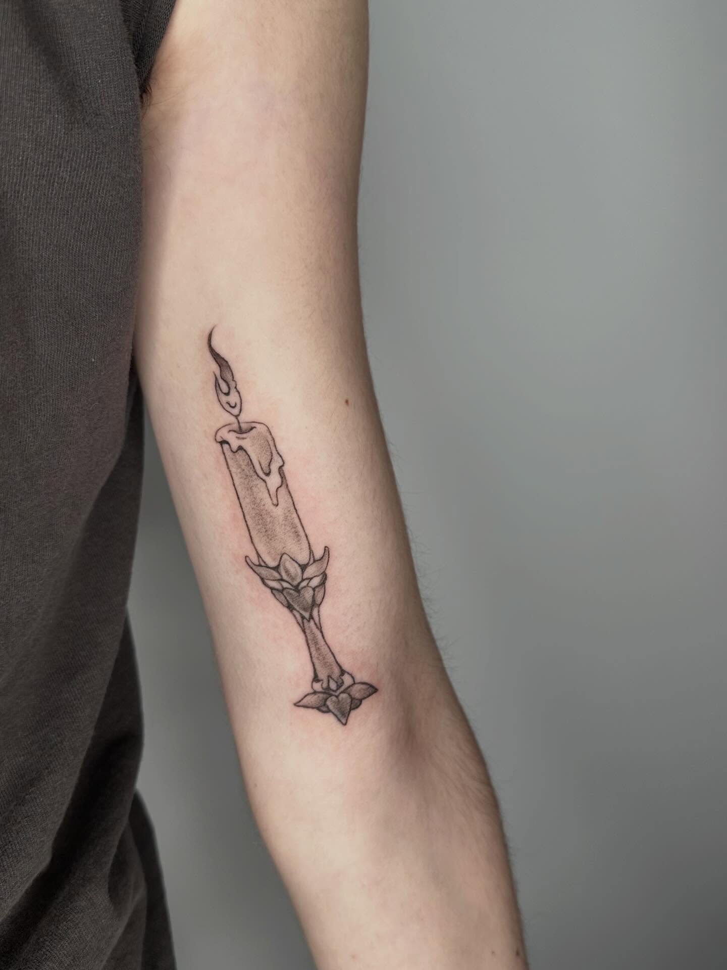 Candle black and grey tattoo on the forearm by Sadie Spades Philly Tattoos