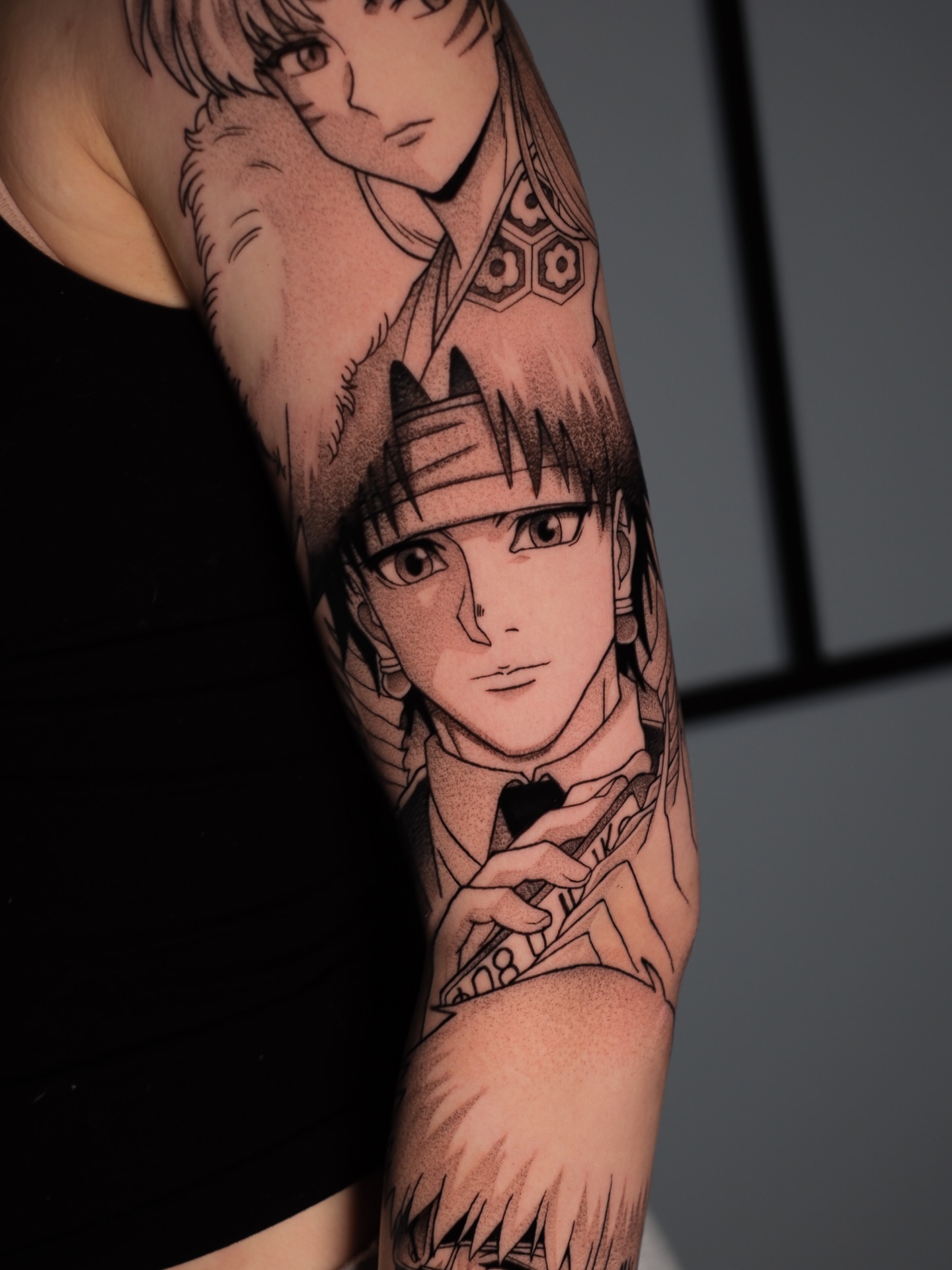 Anime characters anime tattoo on the forearm by Yakir, Houston, Texas