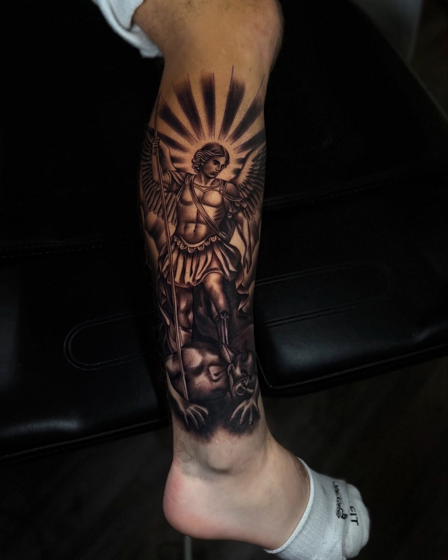 Tattoo by @aaron.tattoos — realism, black_and_grey