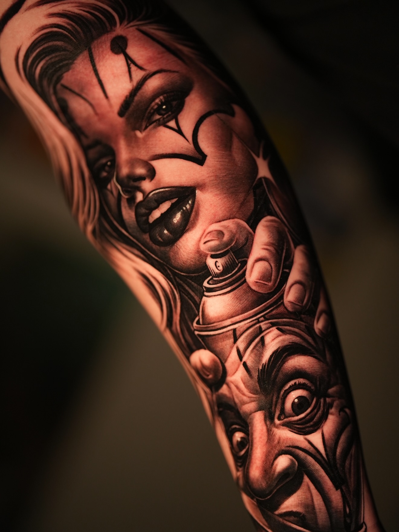 Woman with clown makeup realism tattoo on the forearm by Dillinger, Ventura, California