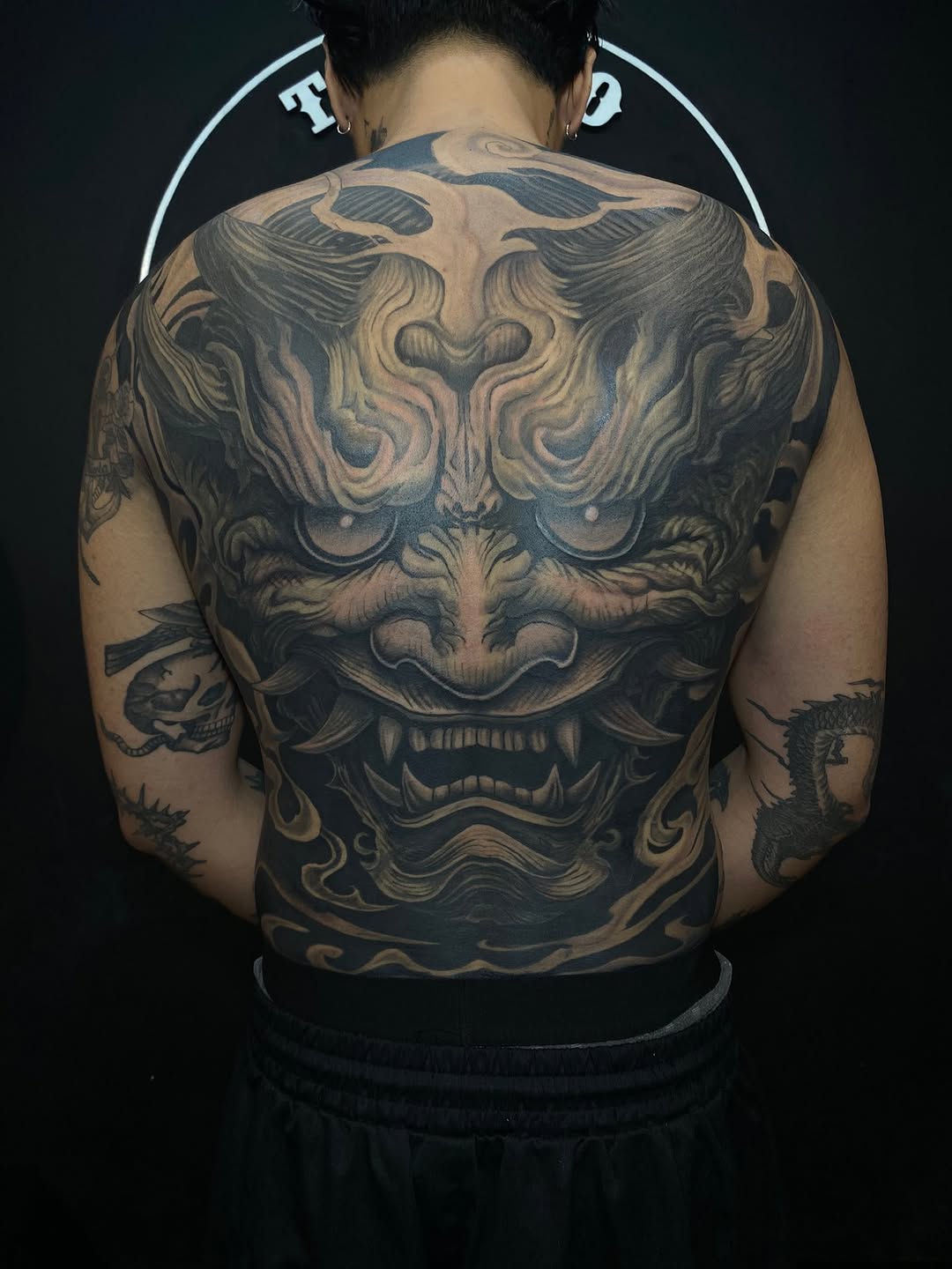 Oni mask and dragon Japanese tattoo on the back by Ferds Villanueva