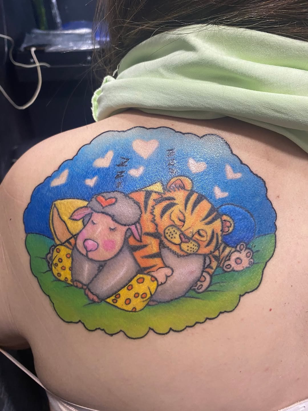 Tiger and sheep sleeping new school tattoo on the back by Ferds Villanueva