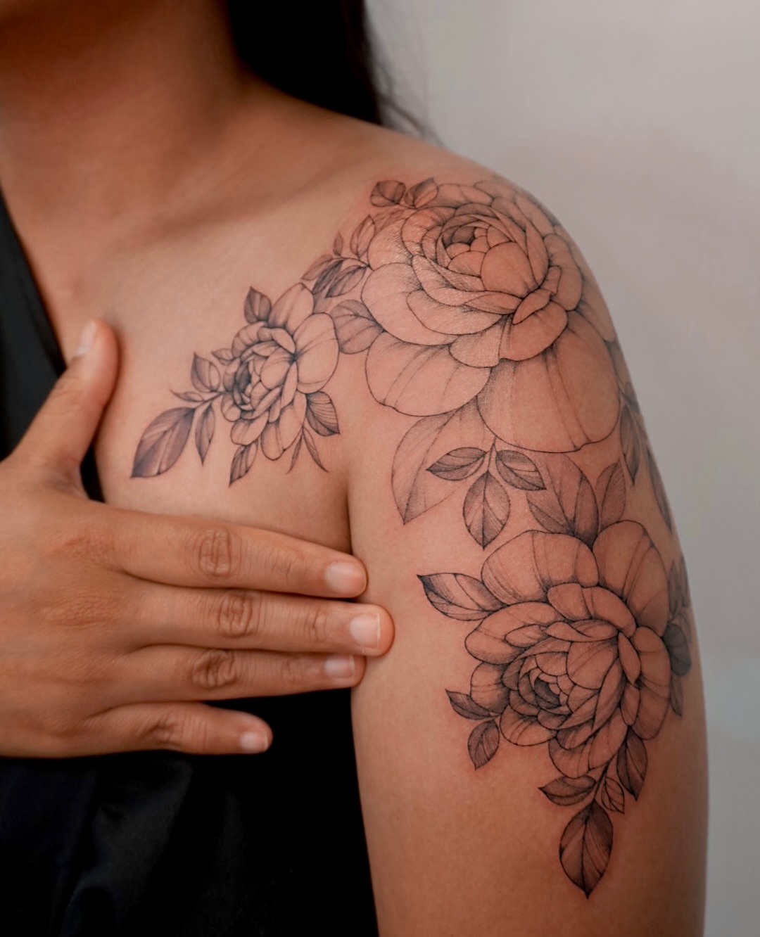 Floral bouquet black and grey tattoo on the shoulder by Hyn[hin]