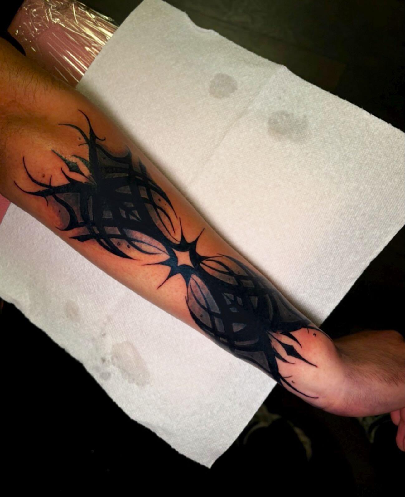 Tribal design tribal tattoo on the forearm by Haley Byers