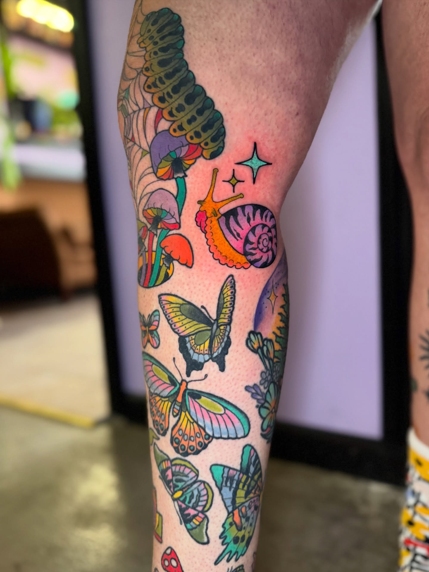 Butterflies and snail new school tattoo on the forearm by 🍄Annie Burkhard🍄, Indianapolis, Indiana