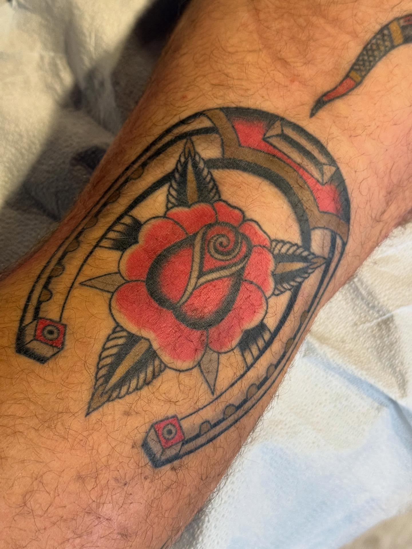 Rose American traditional tattoo on the forearm by Collin Rigsby, Minneapolis, Minnesota
