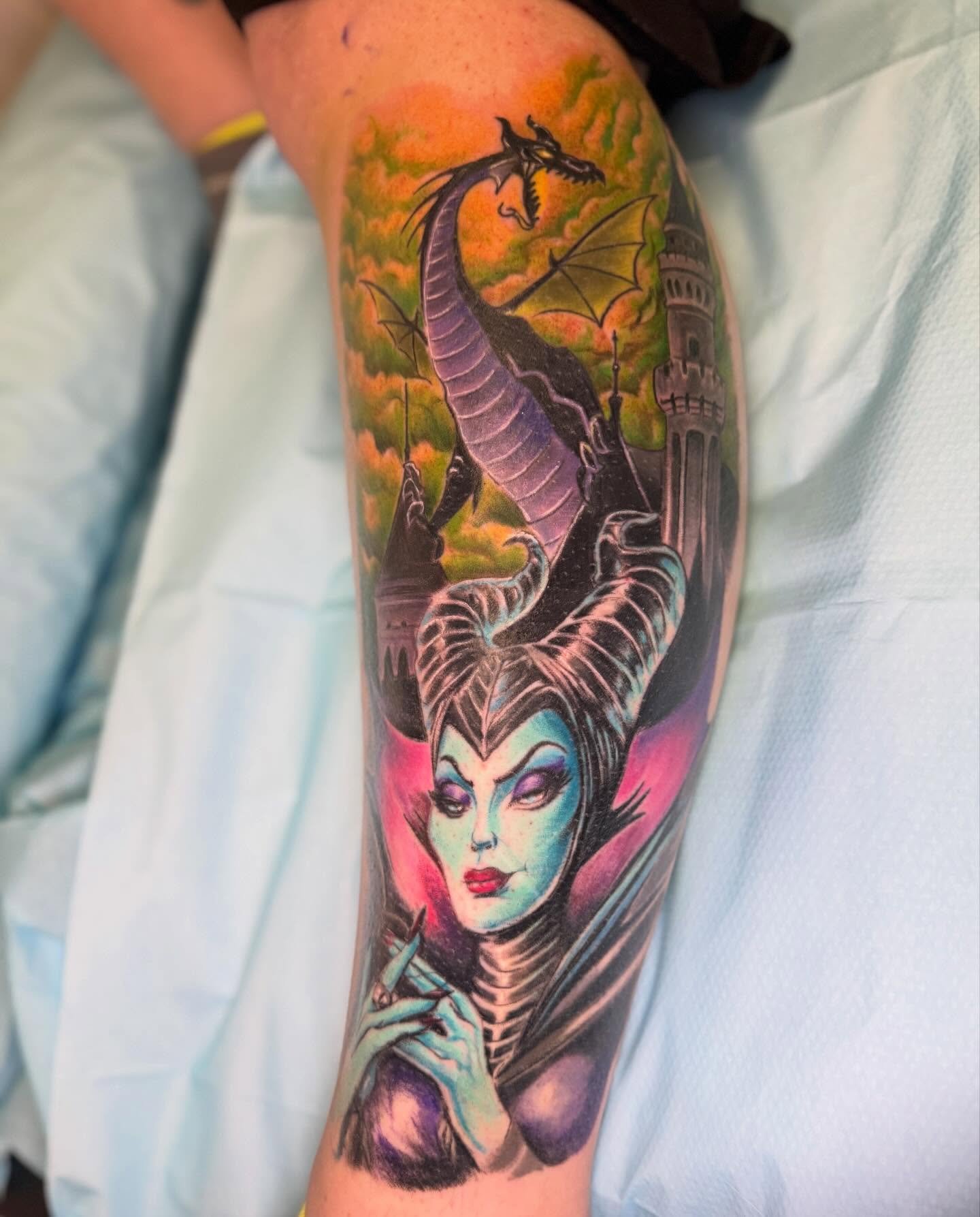 Maleficent dark realism tattoo on the forearm by Vega
