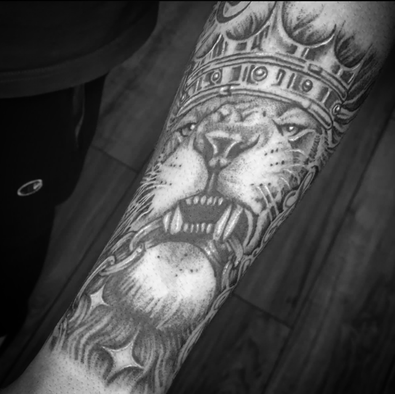 Lion realism tattoo on the forearm by Big Steve Lewis