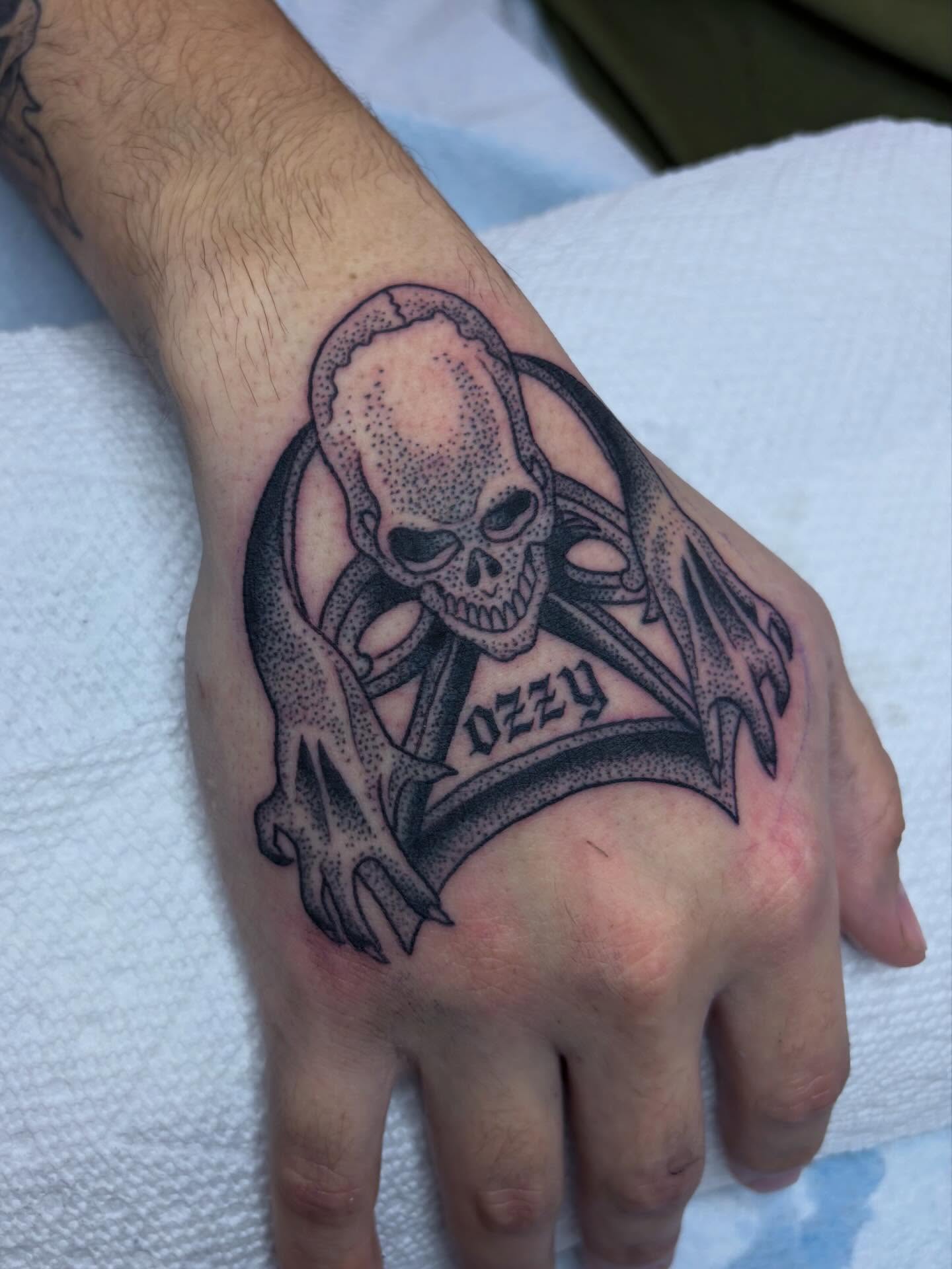 Skull and crossbones dotwork tattoo on the hand by ☠︎ ︎𝗘𝗩𝗔 ☠︎︎