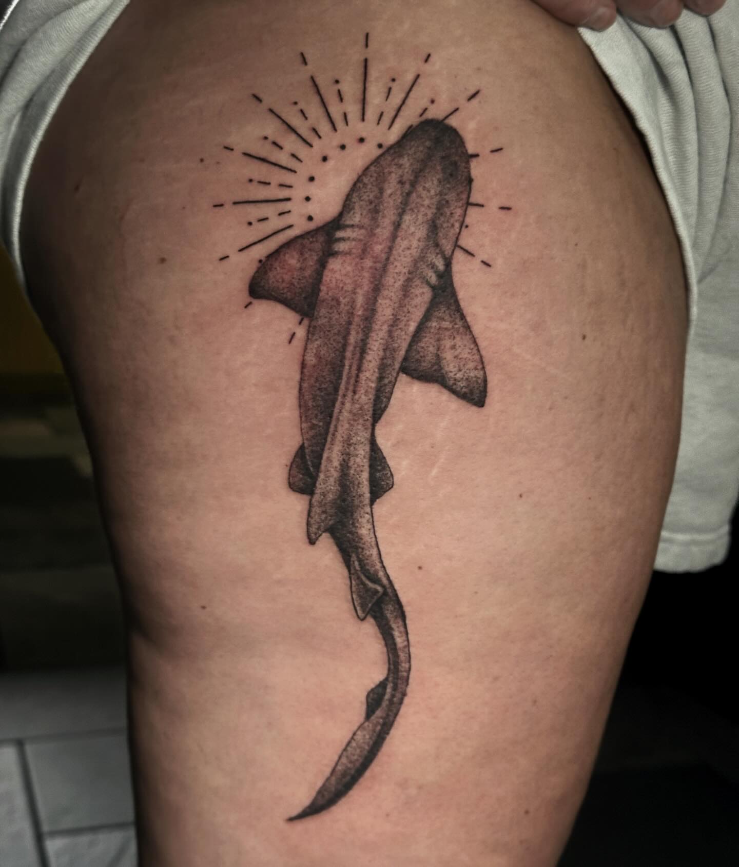 Shark dotwork tattoo on the thigh by Elizabeth Tabler