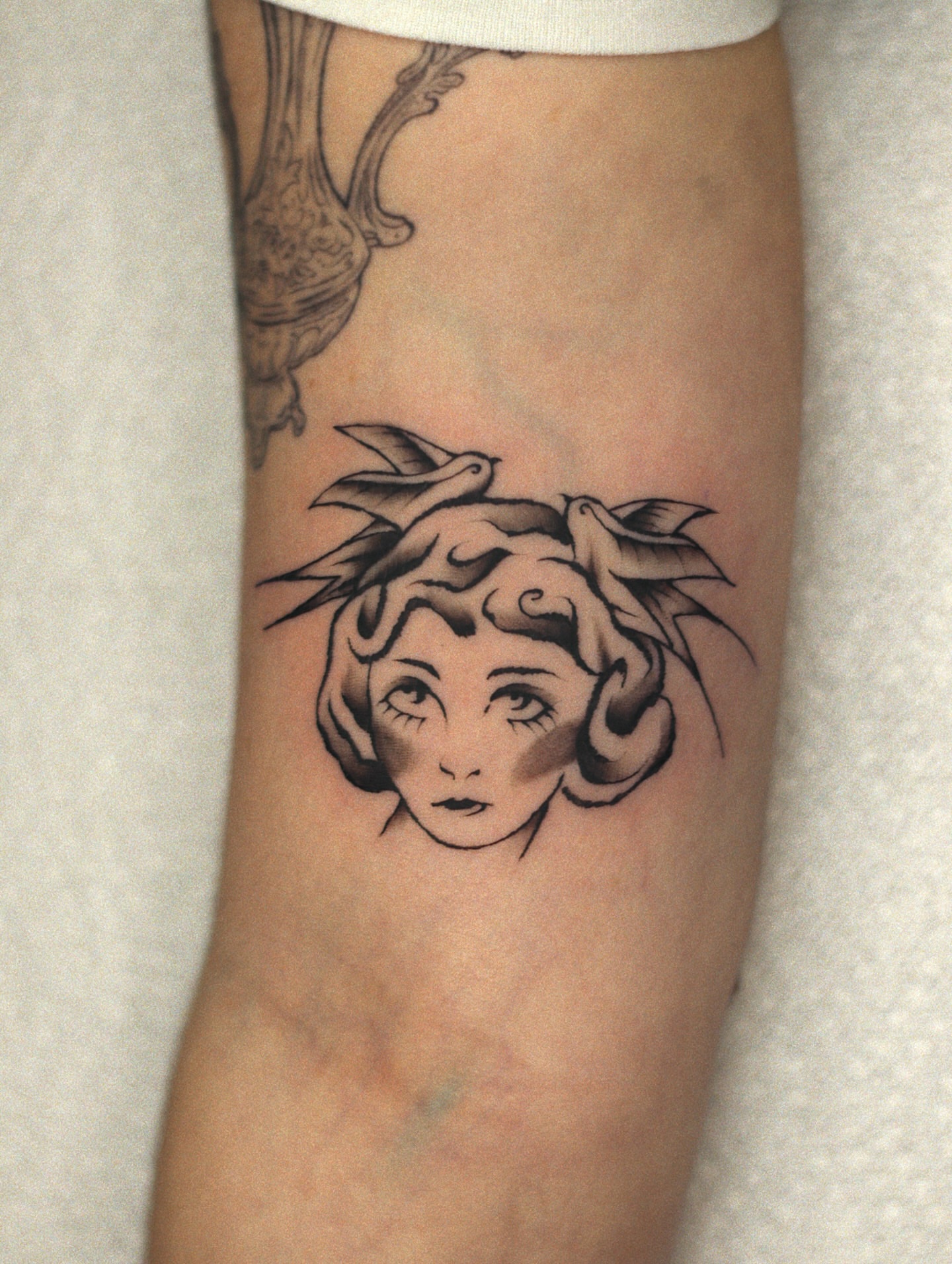Tattoo by @nik.checots — black_and_grey, illustrative