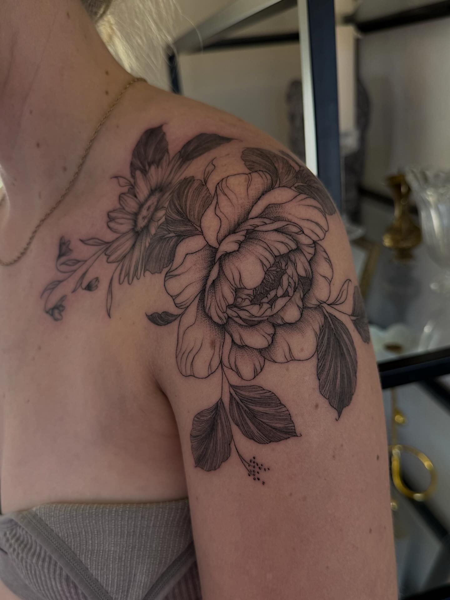 Peony and daisy black and grey tattoo on the shoulder by Shelby Lynn Bayles, Ogden, Utah