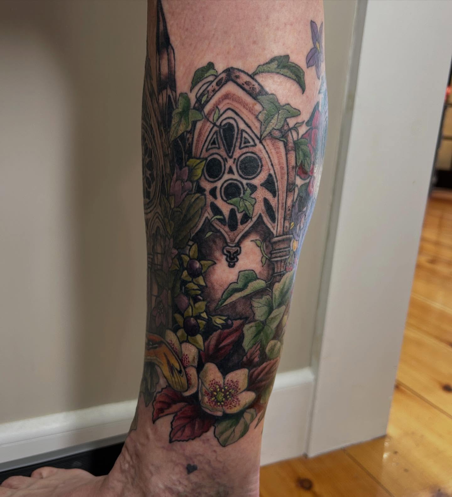 Gothic window with floral elements neo-traditional tattoo on the forearm by 𝓗𝓪𝔂𝓵𝓮𝔂 𝓢𝓪𝓿𝓪𝓰𝓮