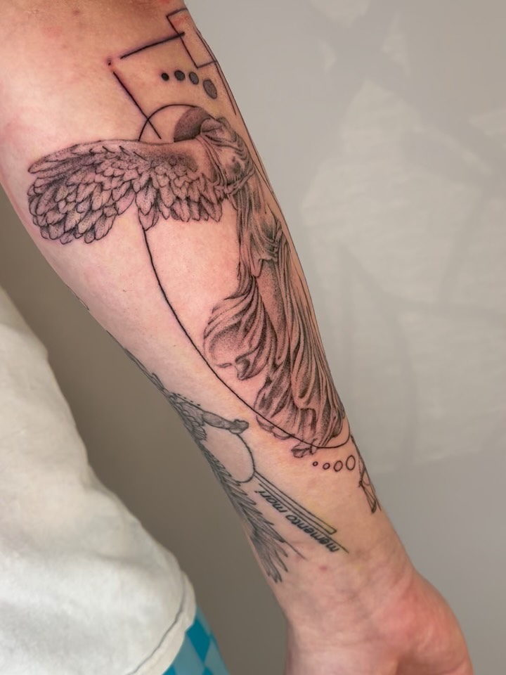 Angel realism tattoo on the forearm by Brandie