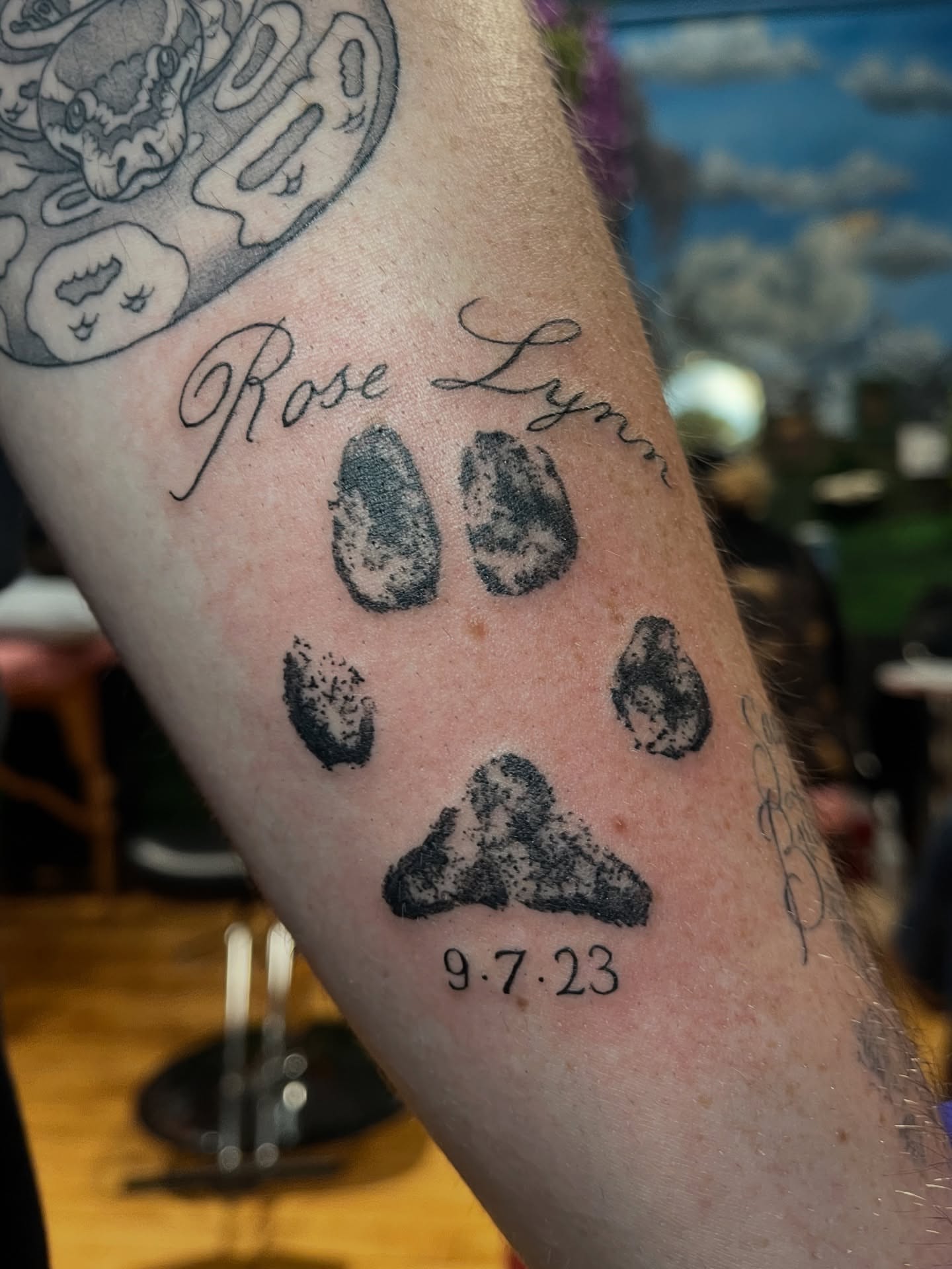 Fingerprints and name dotwork tattoo on the forearm by Zoe Phan, Richmond, Virginia