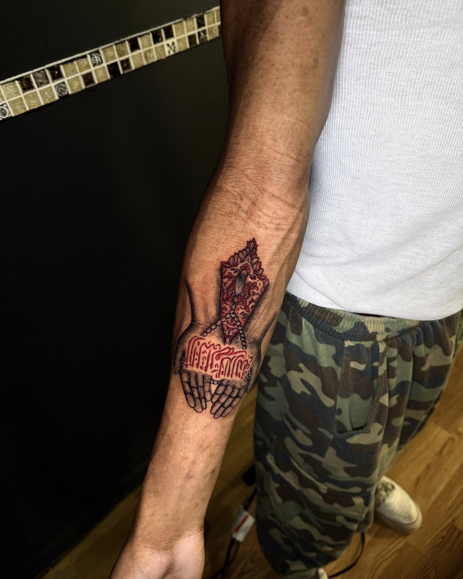 Hands with lace and flame neo-traditional tattoo on the forearm by Javierr Jimenezz
