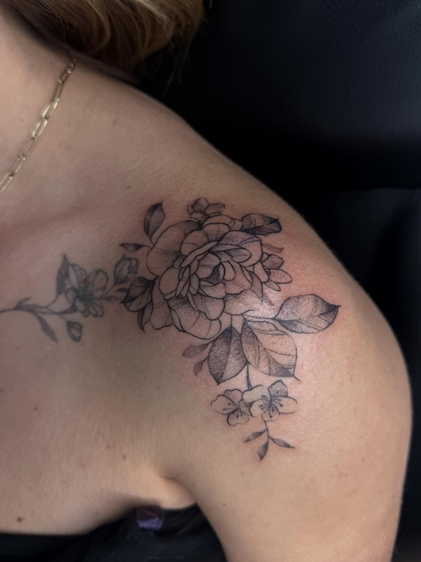 Flower bouquet dotwork tattoo on the shoulder by Susie Maj