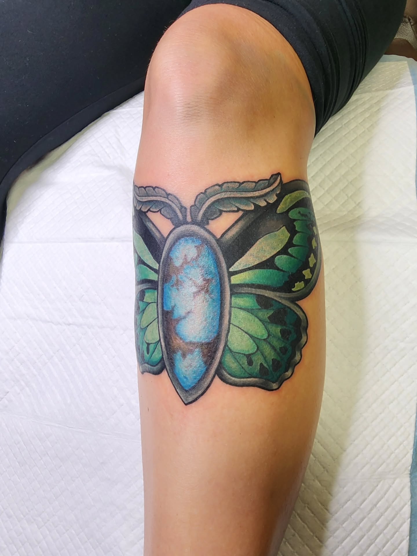 Butterfly realism tattoo on the forearm by Shawna Goettsche