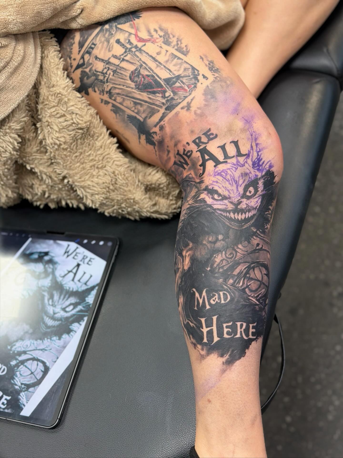 Alice in Wonderland dark realism tattoo on the forearm by Johnny Scillieri