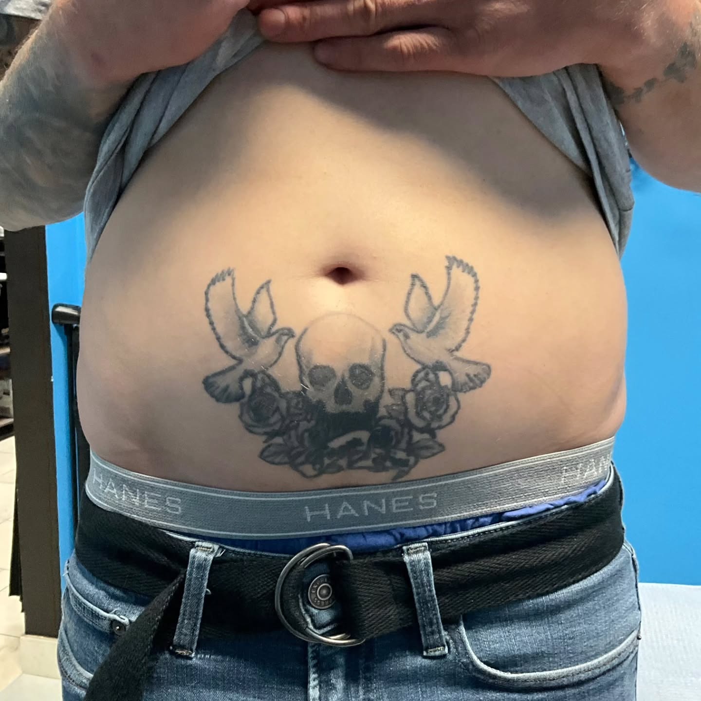 Skull and doves black and grey tattoo on the torso by "Gentle"Jay Blondel