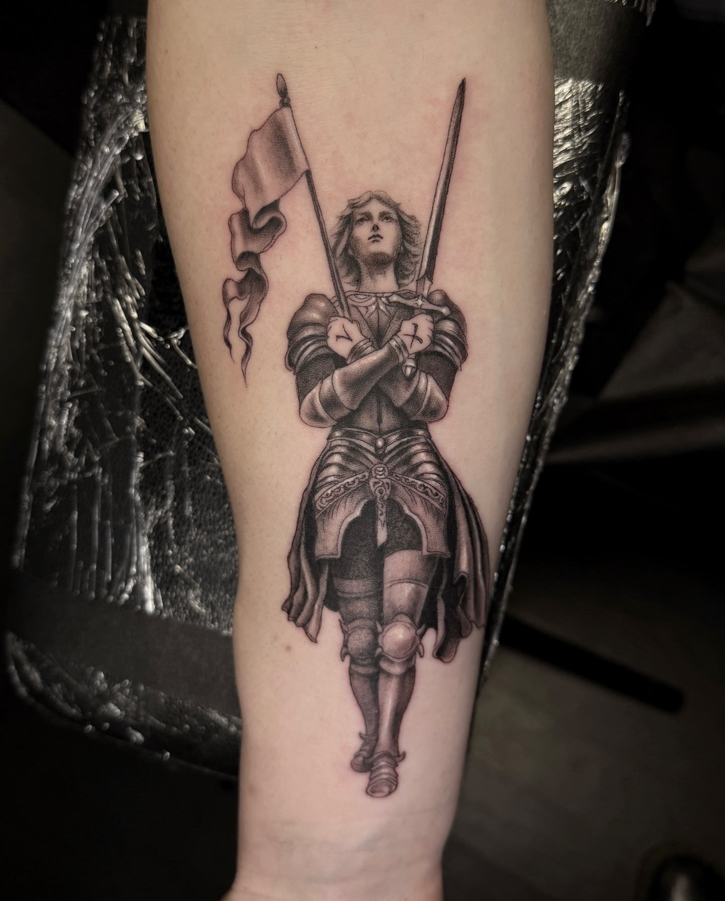 Female knight realism tattoo on the forearm by Madeleine Fleming