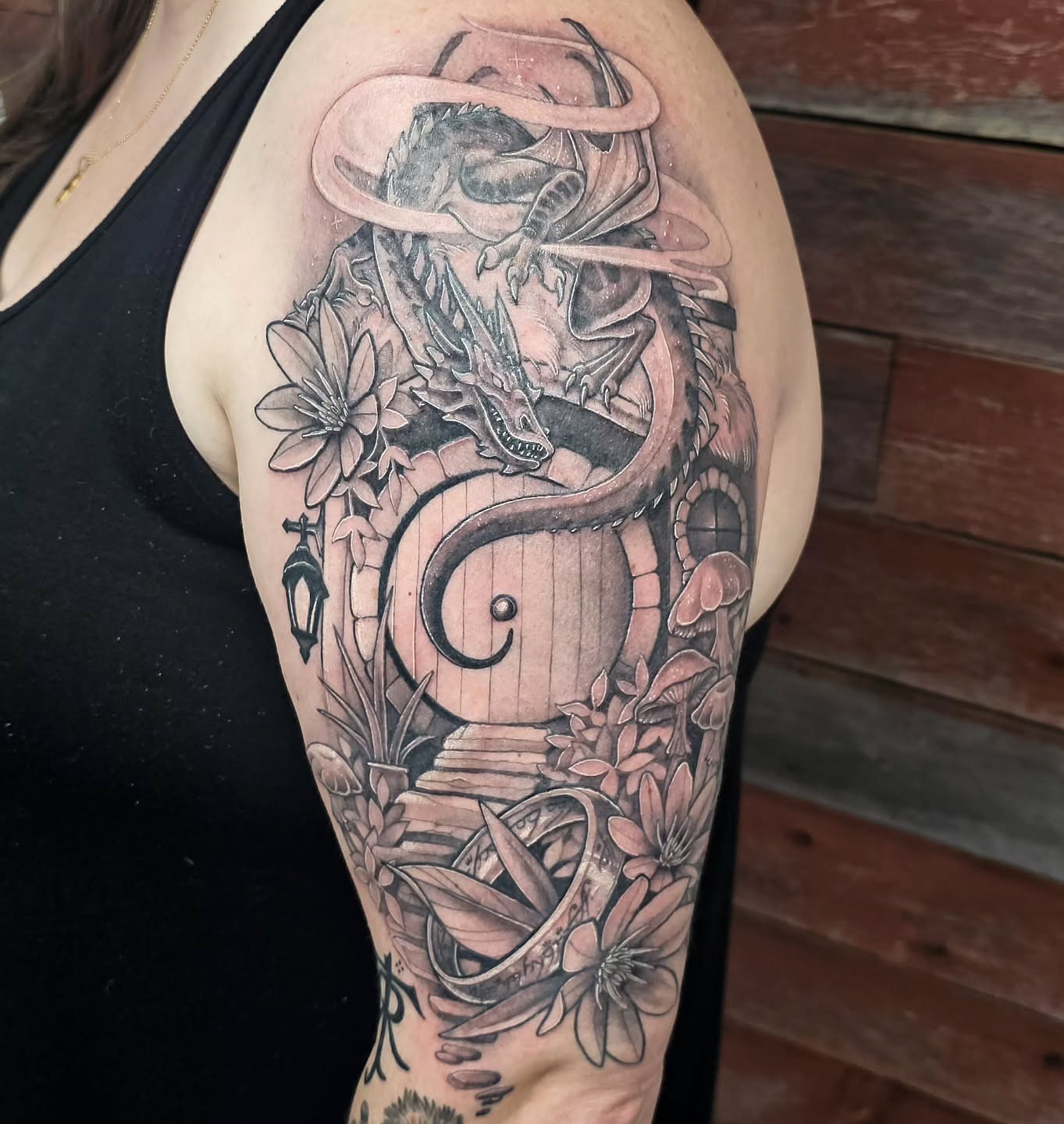 Tattoo by @plaidbear_designco — black_and_grey, realism