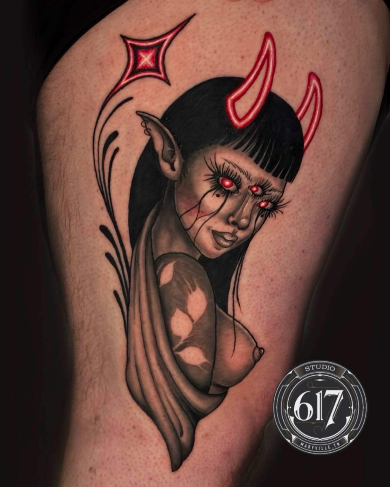 Demon woman dark realism tattoo on the thigh by Olivia DeCarr, Maryville, Tennessee