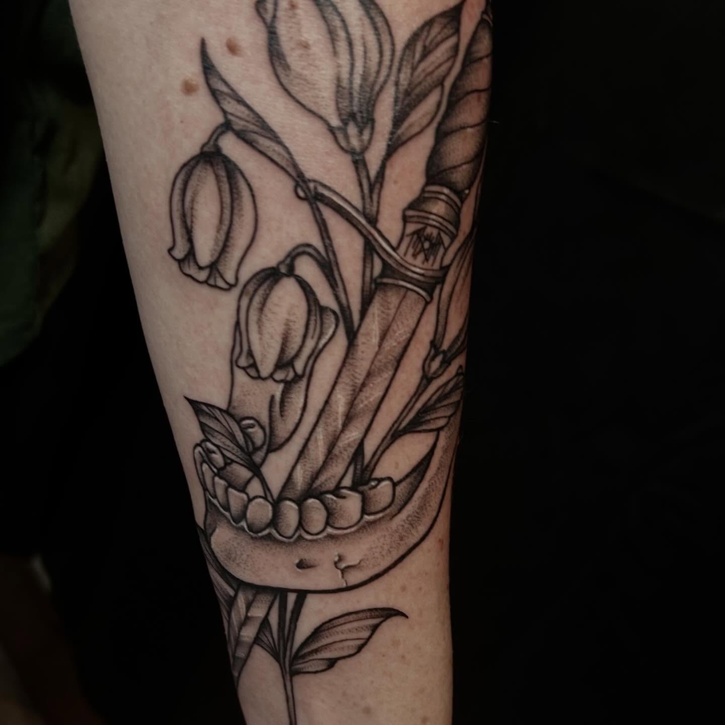Bell flowers black and grey tattoo on the forearm by abby ☽ marie