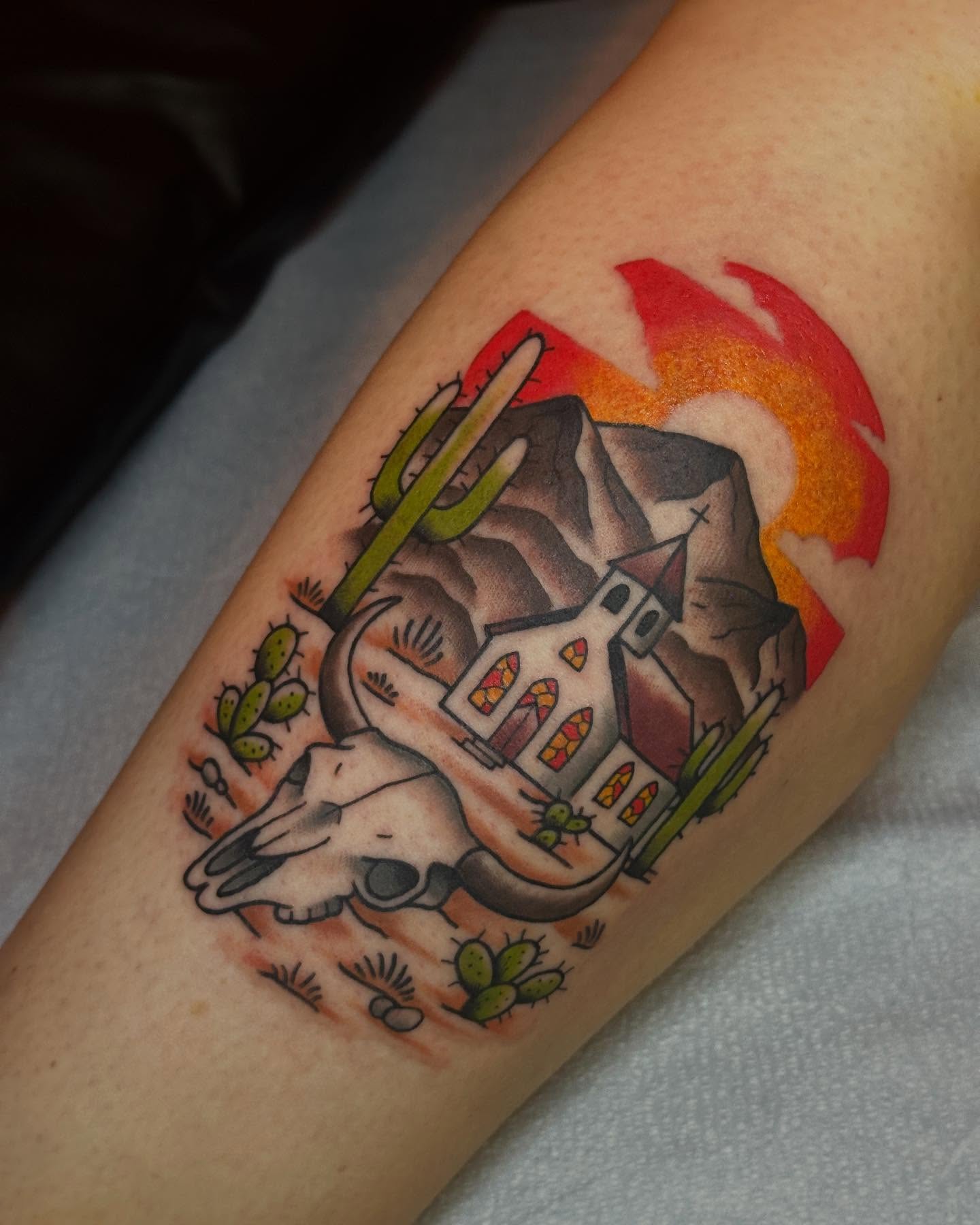 Desert landscape American traditional tattoo on the forearm by Zach Gonzalez, Austin, Texas