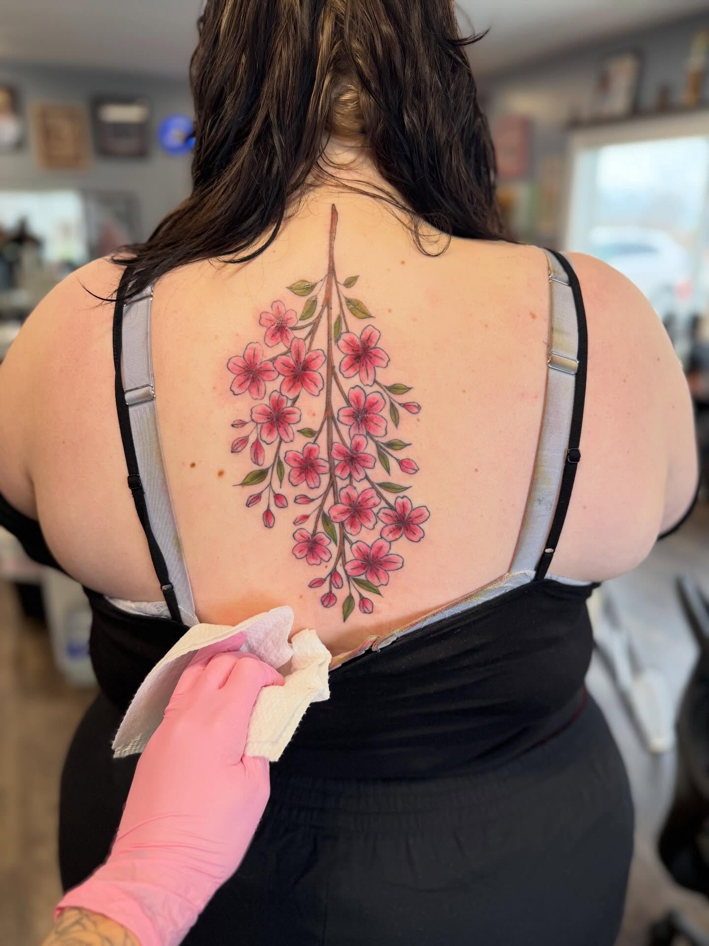 Cherry blossoms dotwork tattoo on the back by Hope Powell, Vancouver, Washington