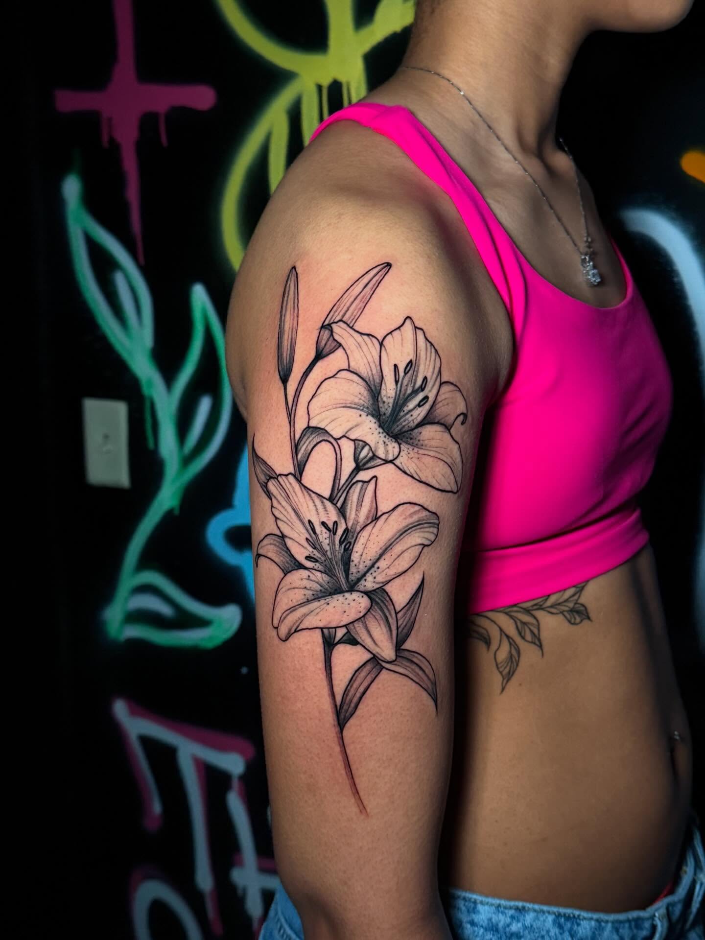 Lilies black and grey tattoo on the forearm by Kbtattz