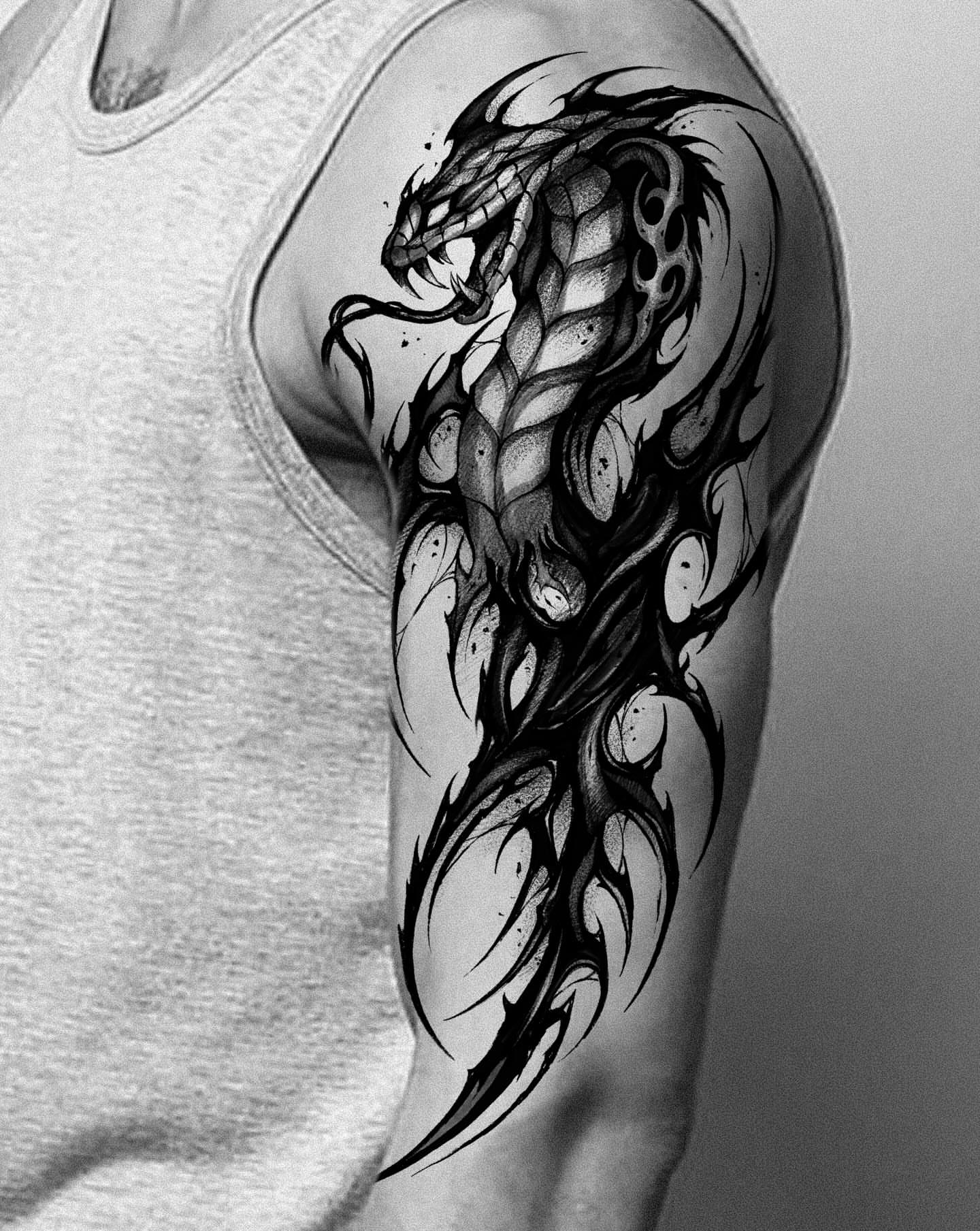 Snake tribal tattoo on the shoulder by Kimgang 김강