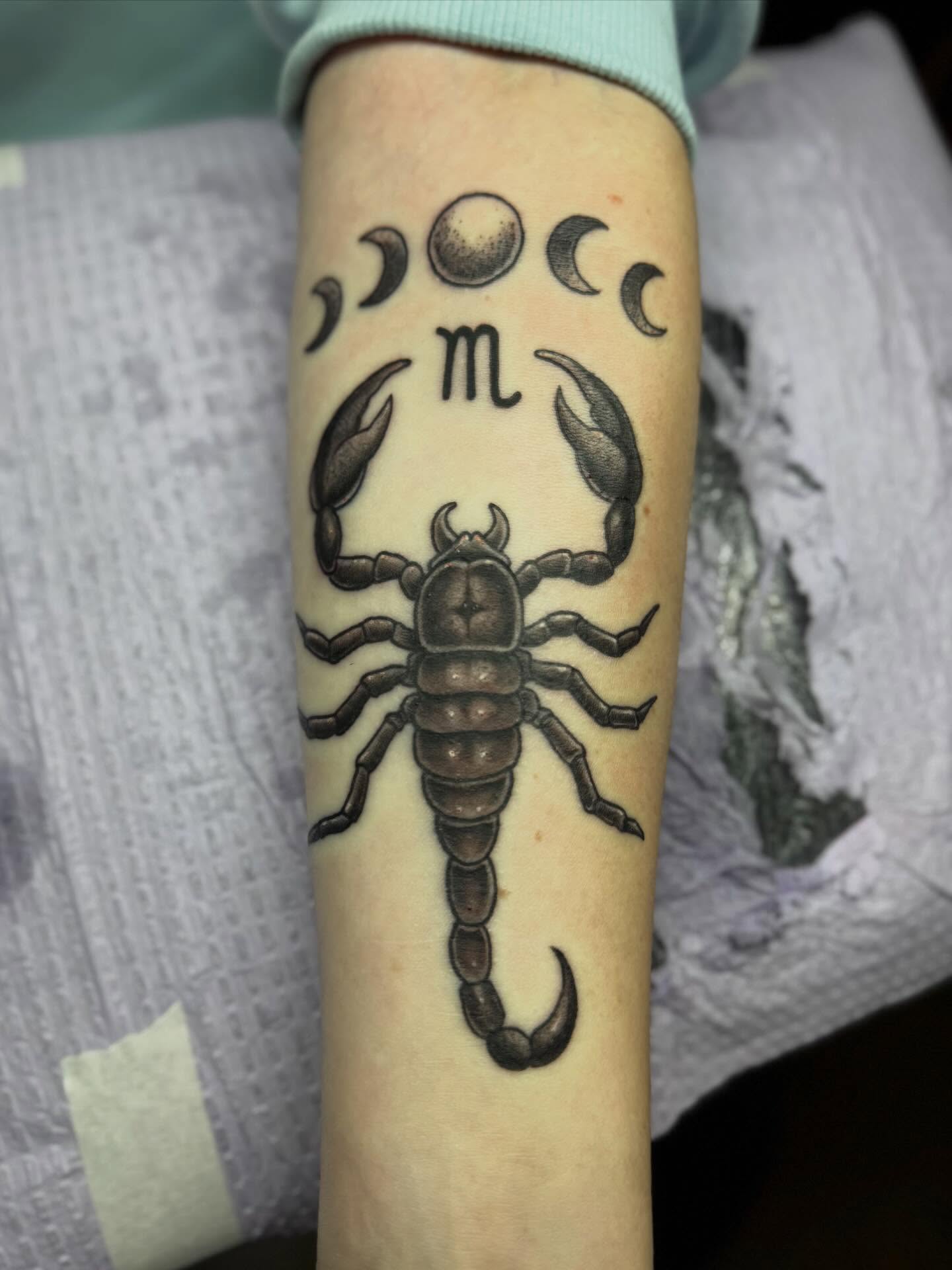 Scorpion black and grey tattoo on the forearm by Justin Fiveson