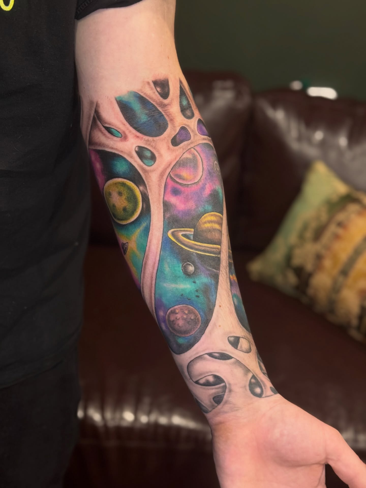 Galactic tree surrealism tattoo on the forearm by Lily Nurnberger