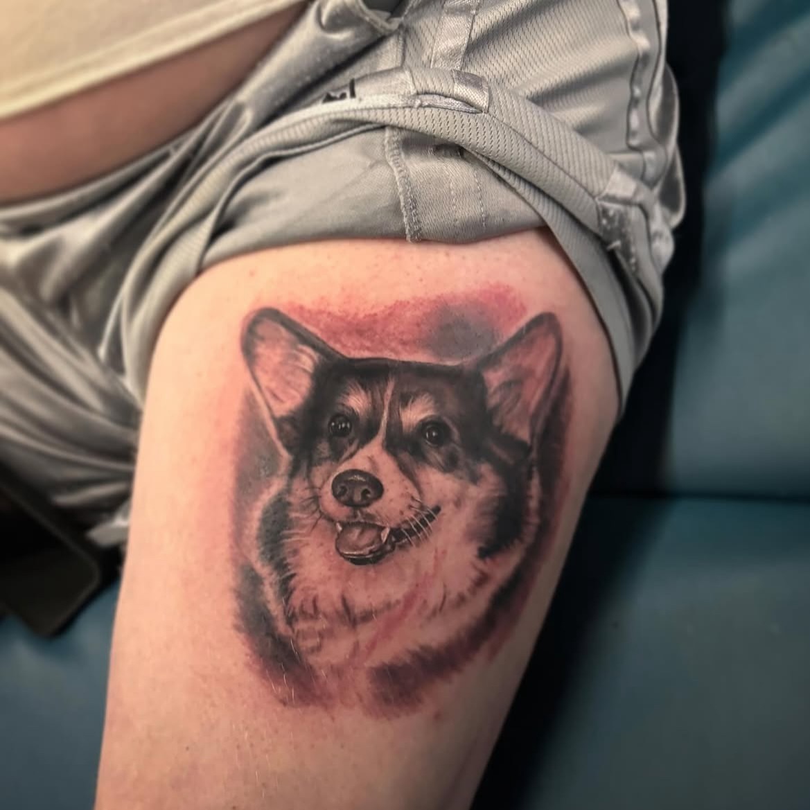 Corgi realism tattoo on the thigh by Caitlin Curtis Tattoos & Booking, Dayton, Ohio