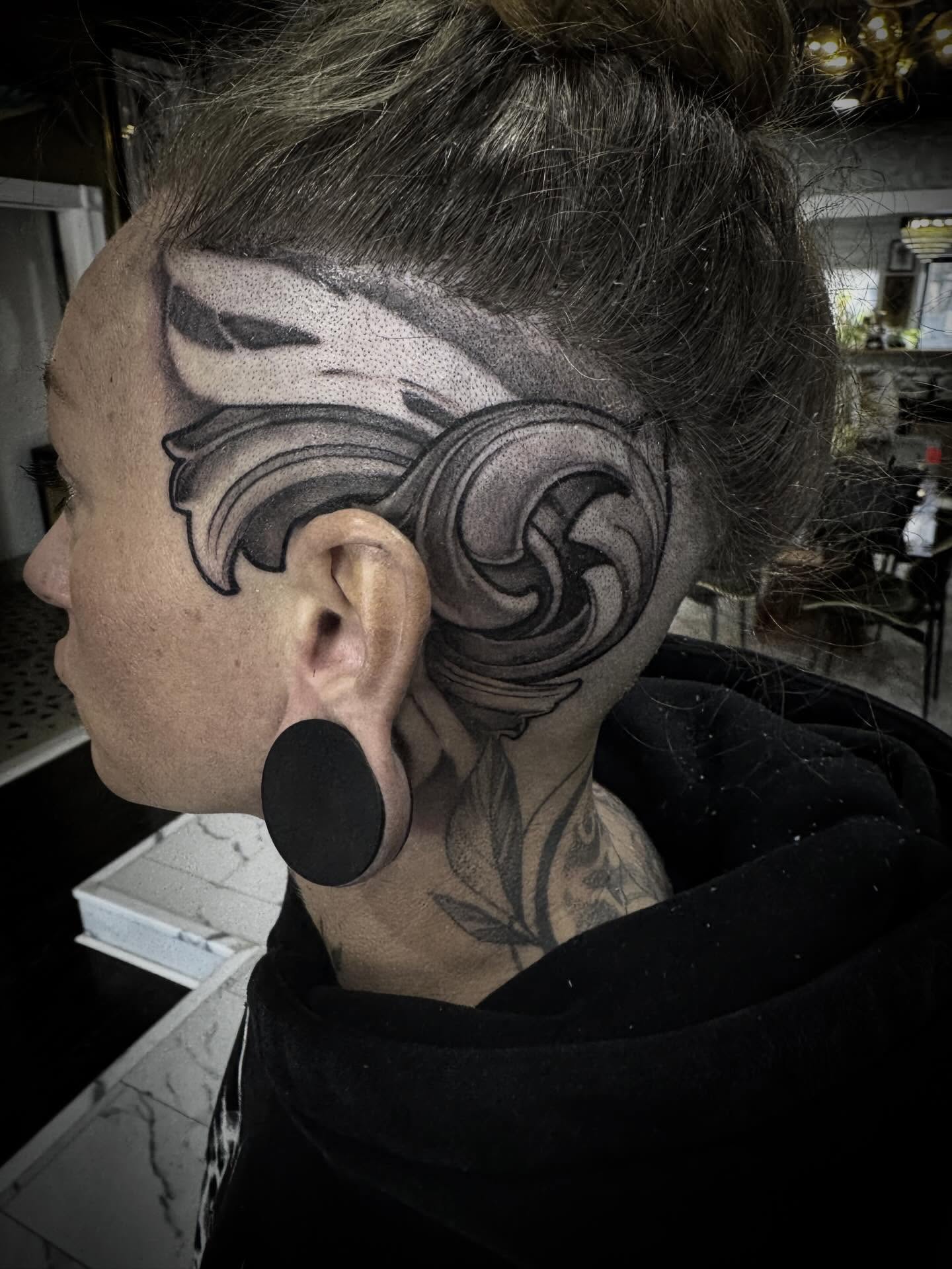 Swirl dotwork tattoo on the head by Keith Smith