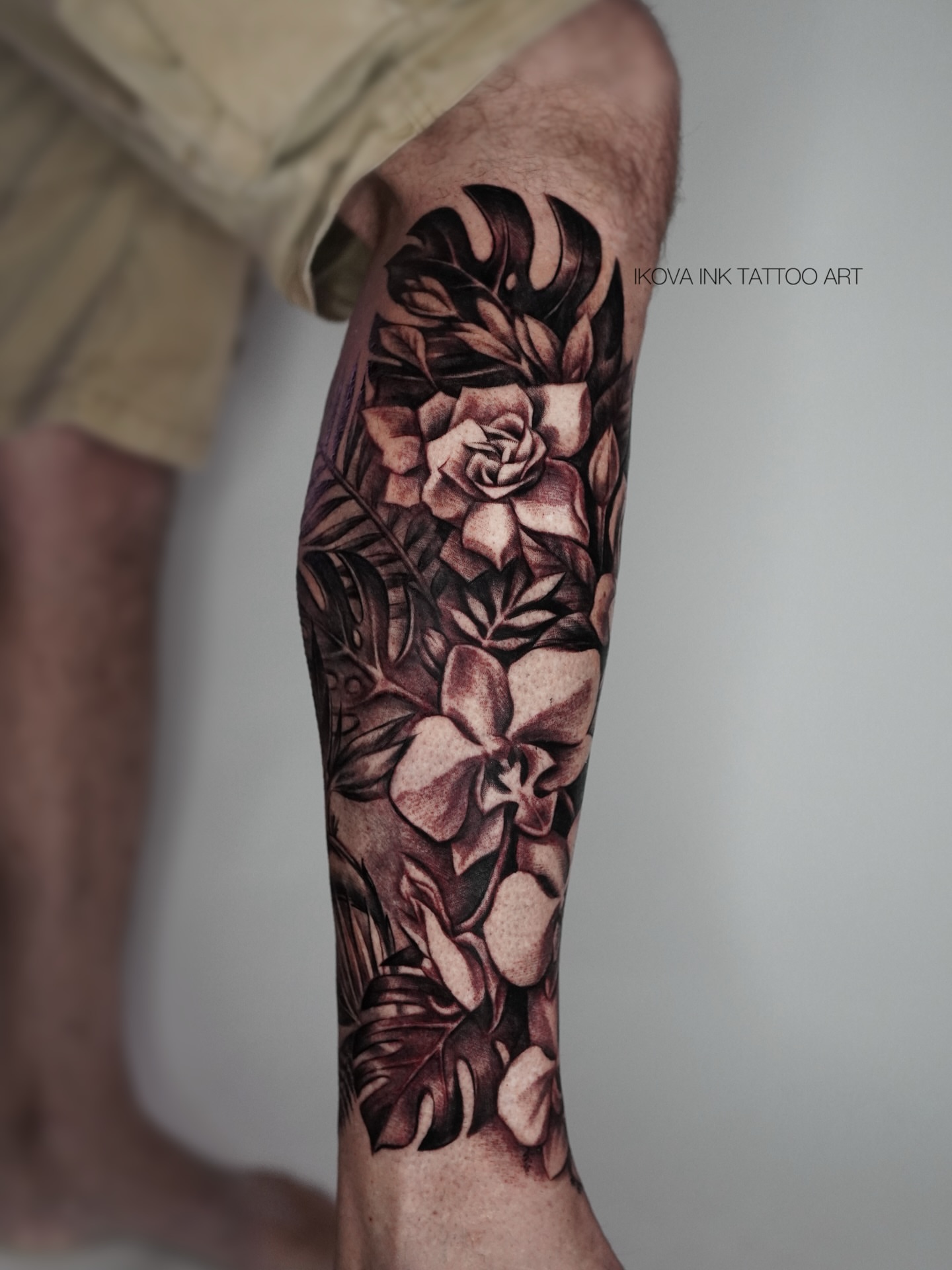 Floral arrangement realism tattoo on the calf by Tattoo Artist Miami & la, Hollywood, Florida
