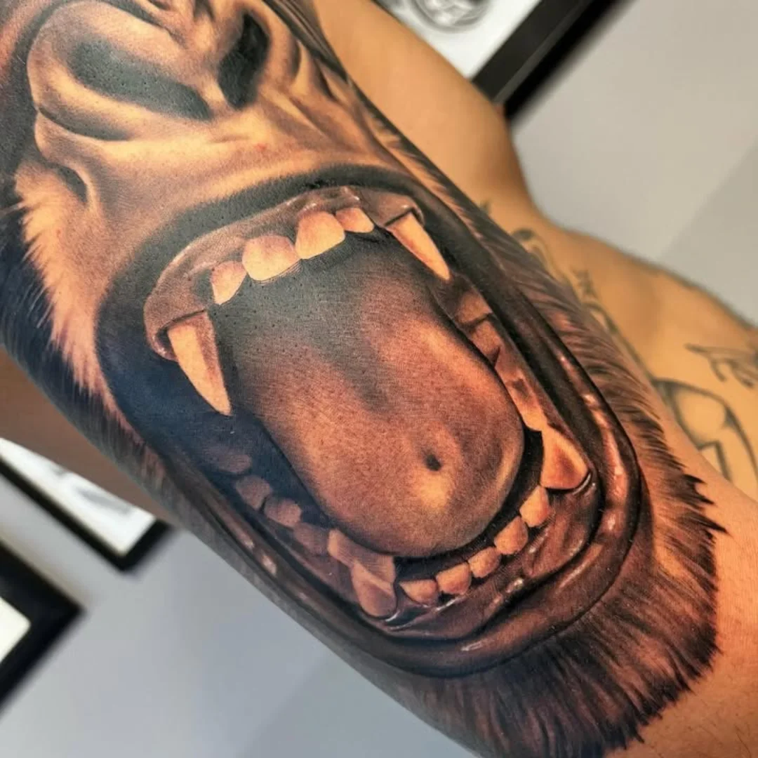 Grinning skull realism tattoo on the forearm by ink.alchemist