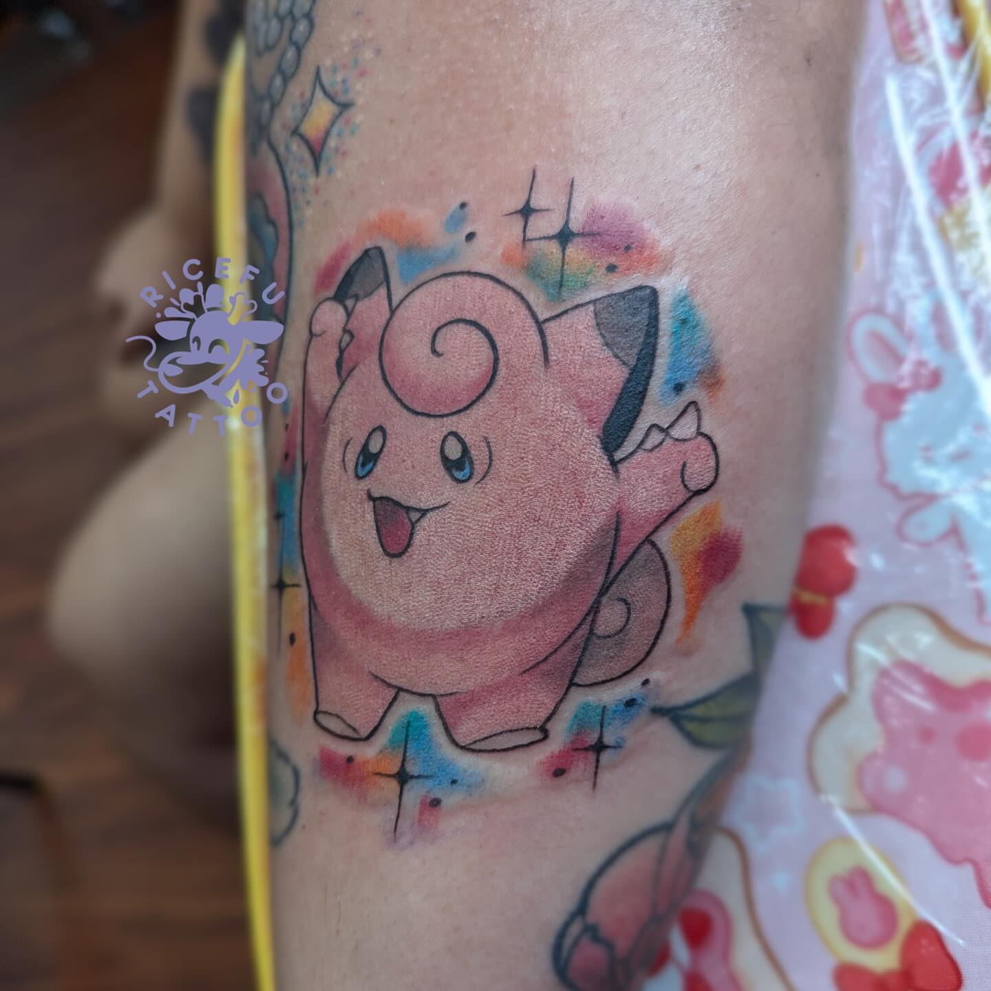 Jigglypuff watercolor tattoo on the forearm by Ricefu Art & Tattoo