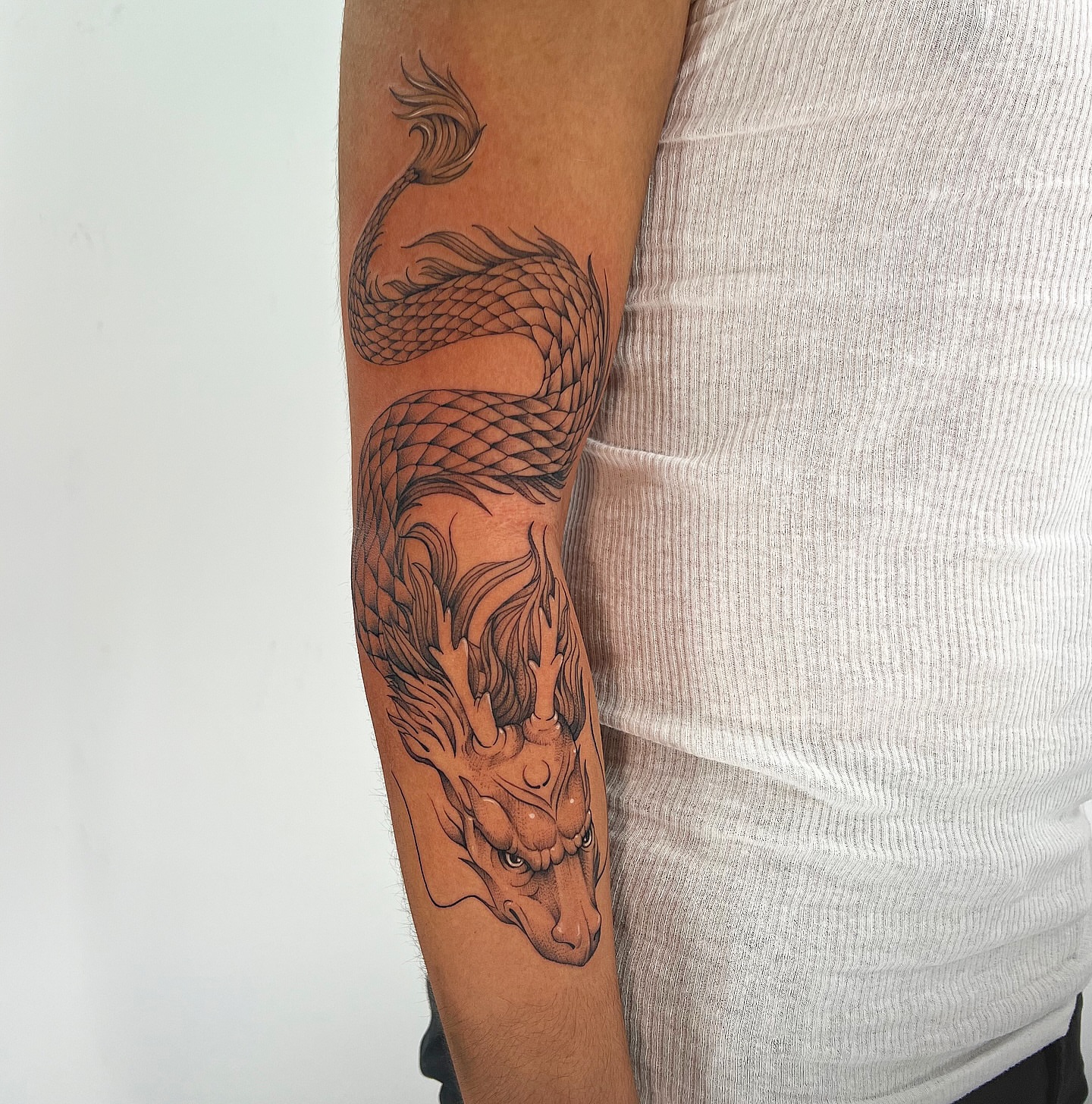 Dragon realism tattoo on the forearm by ⚒dptattoos ⚒, East Williamsburg, Brooklyn