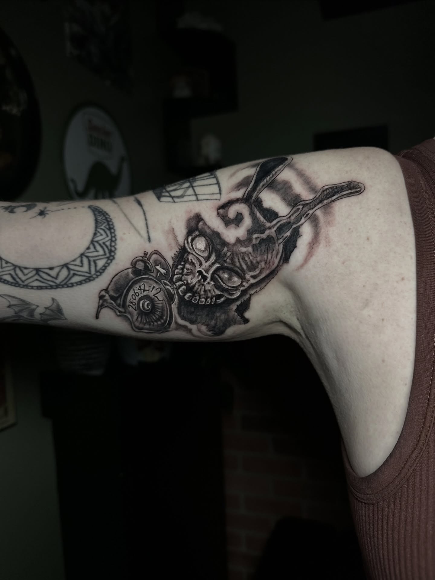 Tattoo by @ladymonsterfacetattoos — black_and_grey, dark_realism