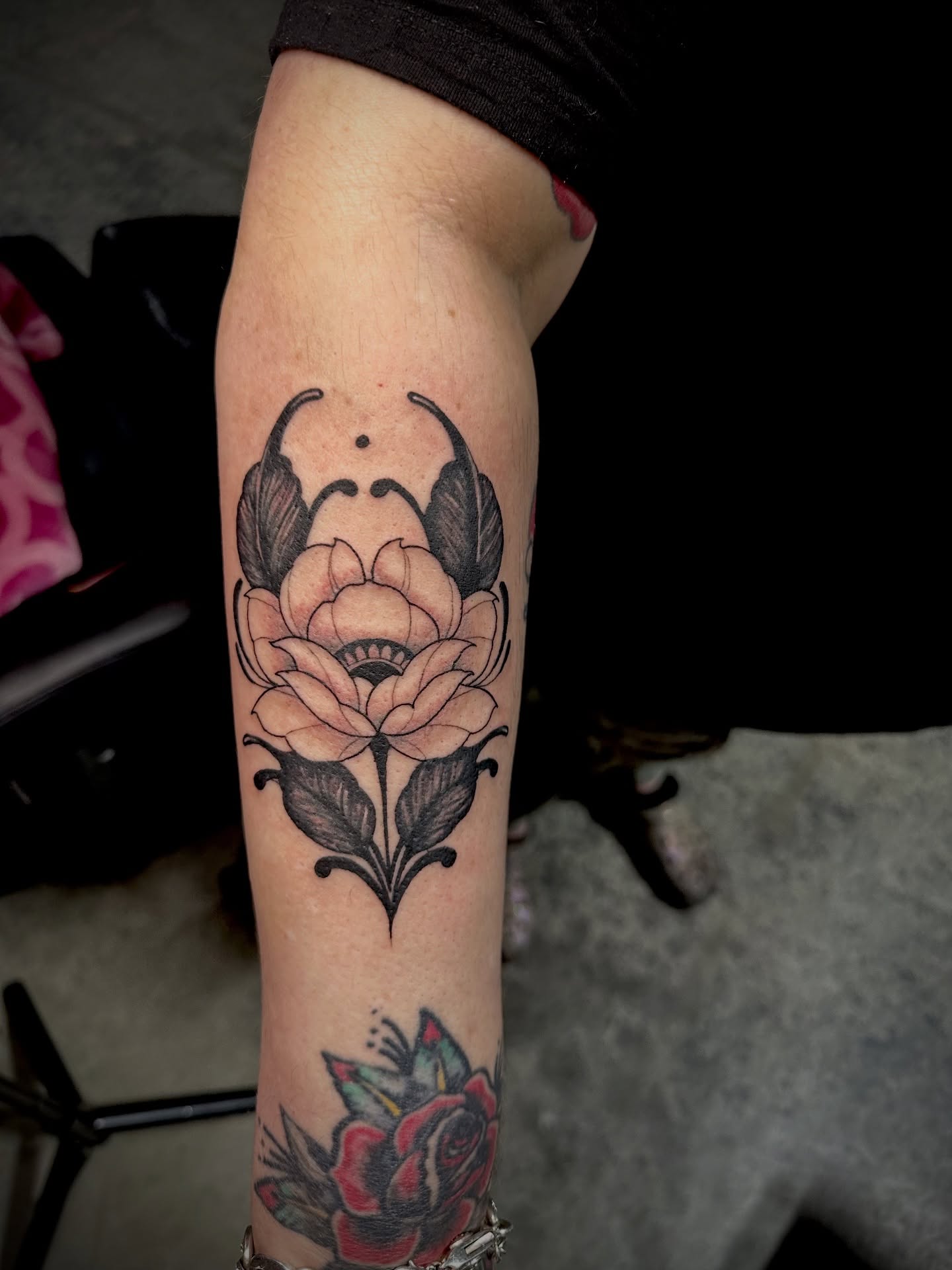 Peony flower American traditional tattoo on the forearm by Elizabeth’s Eclectic Tattoos