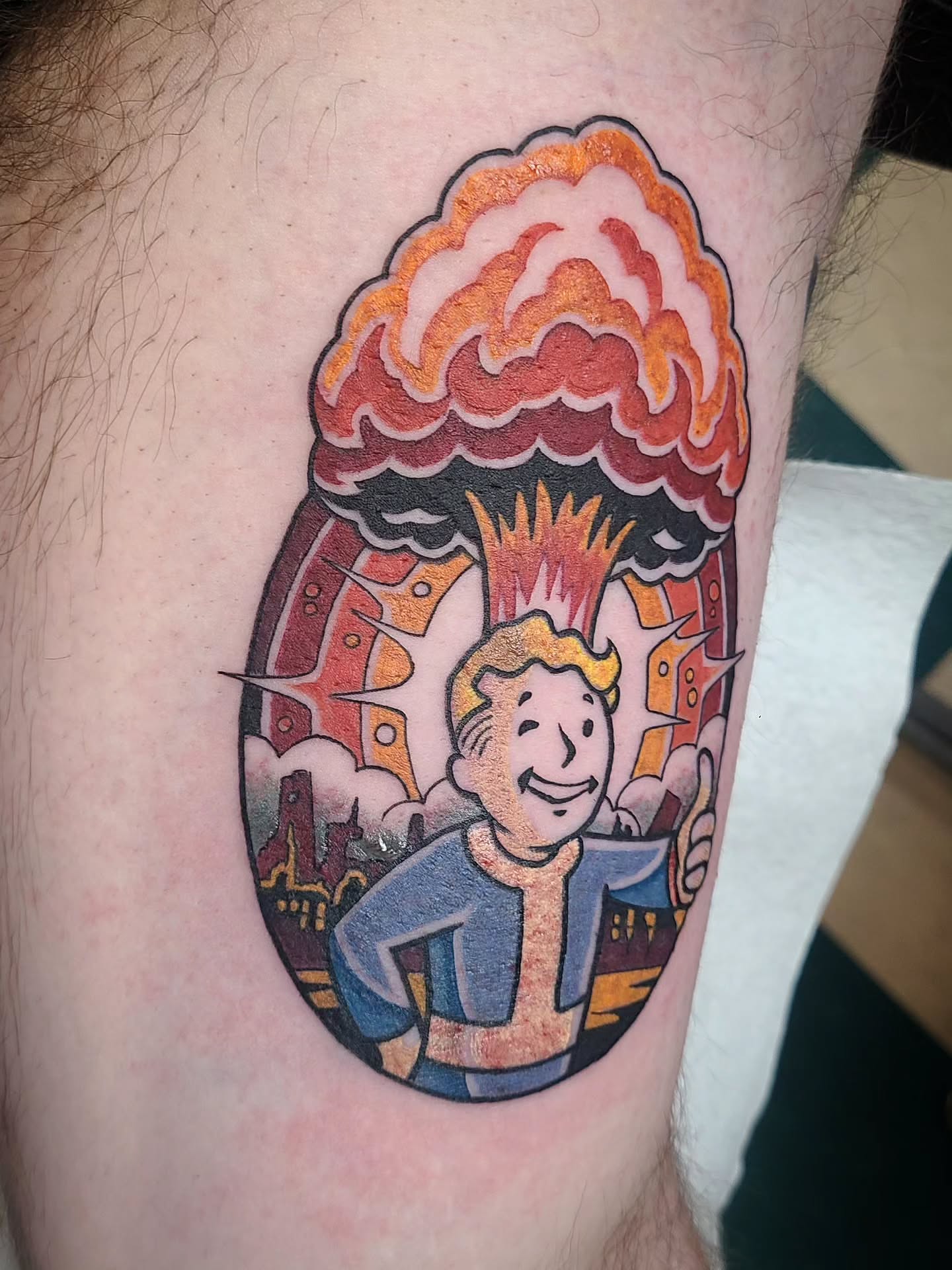 Vault Boy American traditional tattoo on the thigh by David Vodicka