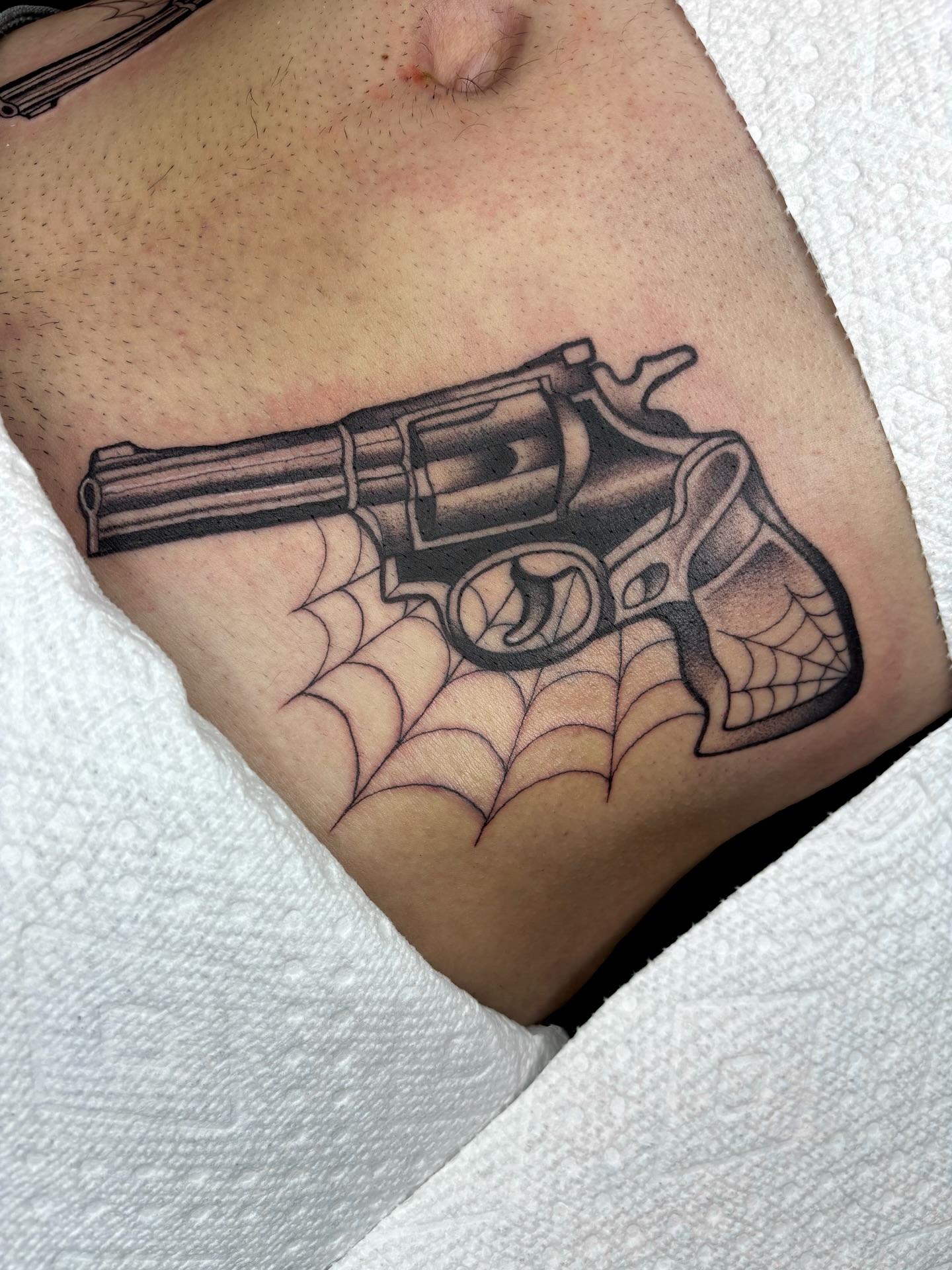 Revolver black and grey tattoo on the chest by ✩ Tattoo ✩, Las Vegas, Nevada