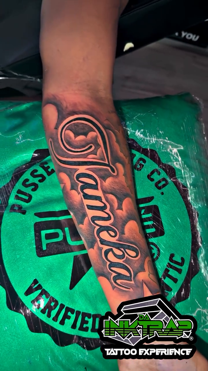 Nameka script with clouds and stars lettering script tattoo by Atlanta Tattoo Artist βπ½