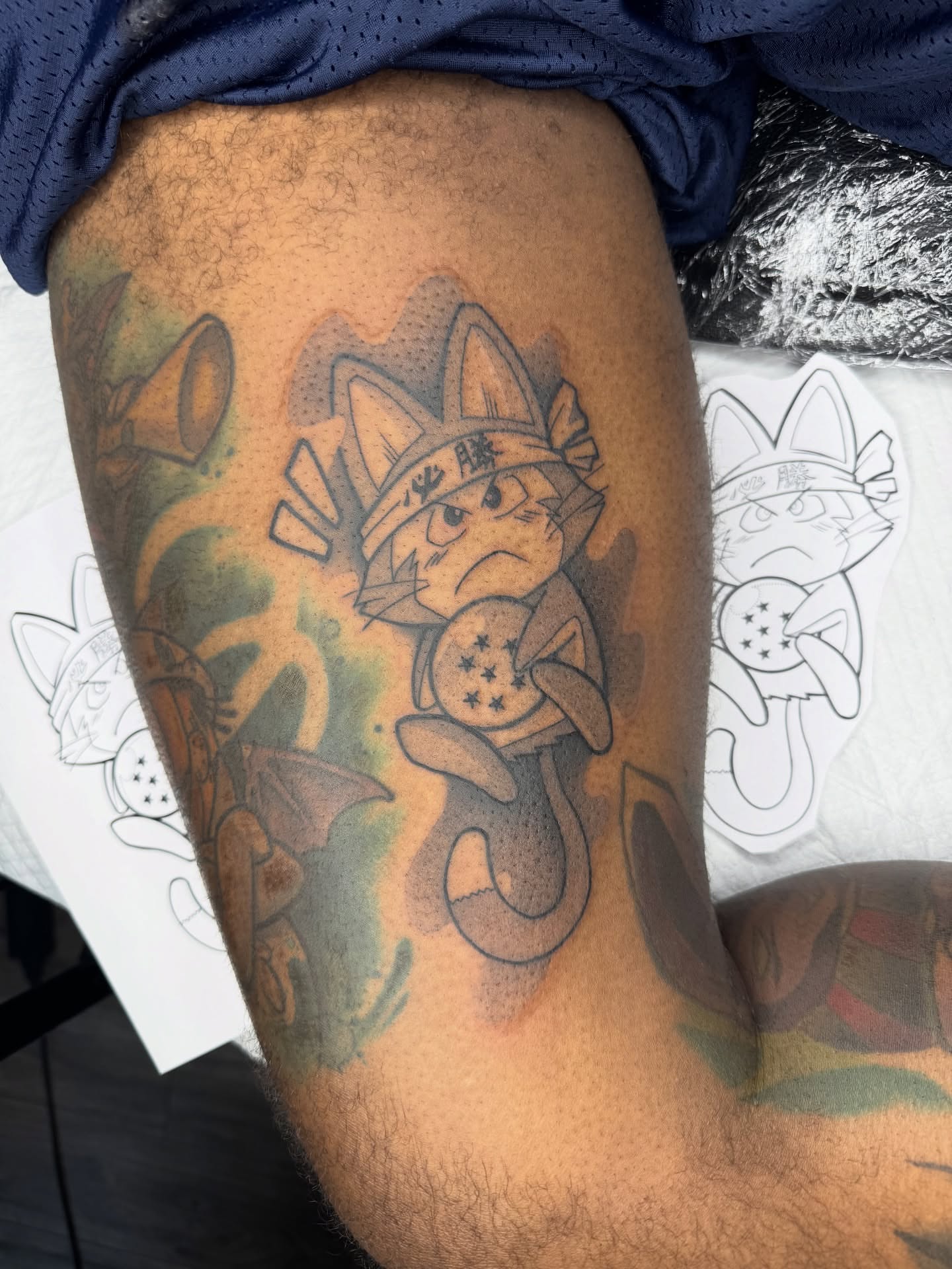Cat with hat dotwork tattoo on the thigh by Donnie Moore